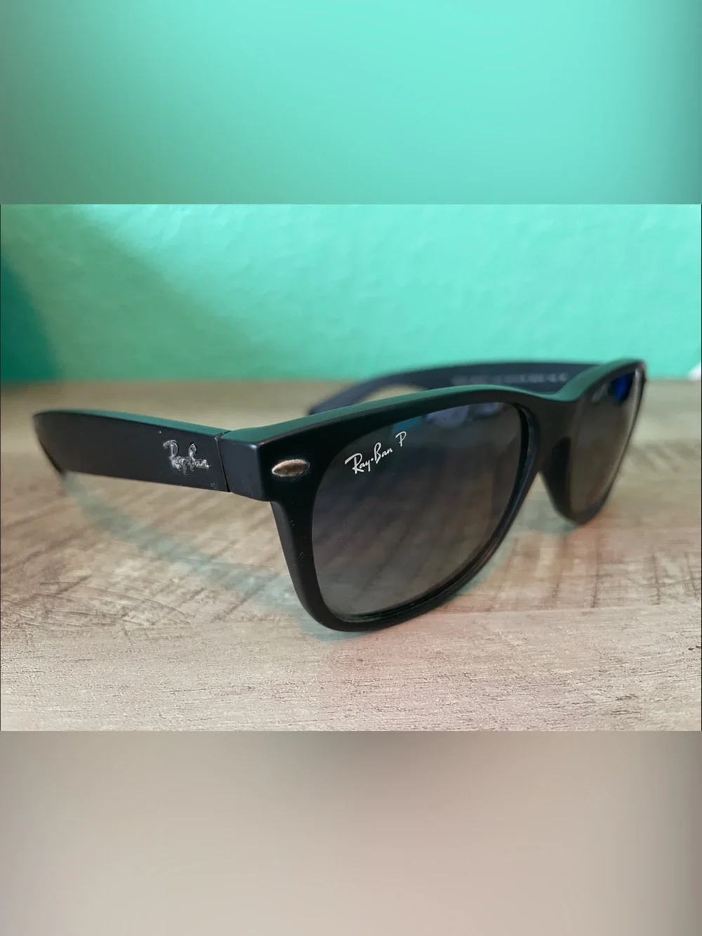 Ray-Ban Black Frame Sunglasses with Dark Lenses